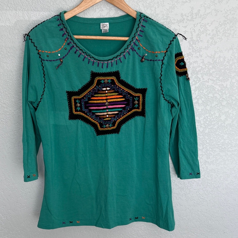 Vibrant Teal Embroidered Women's Blouse
0038